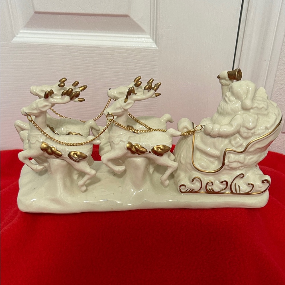 Elegant Holiday Santa Sleigh with Reindeer Figurine